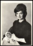 #63 Jackie Poses With Son John Jr.  