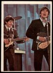 #63 George and John playing in concert  